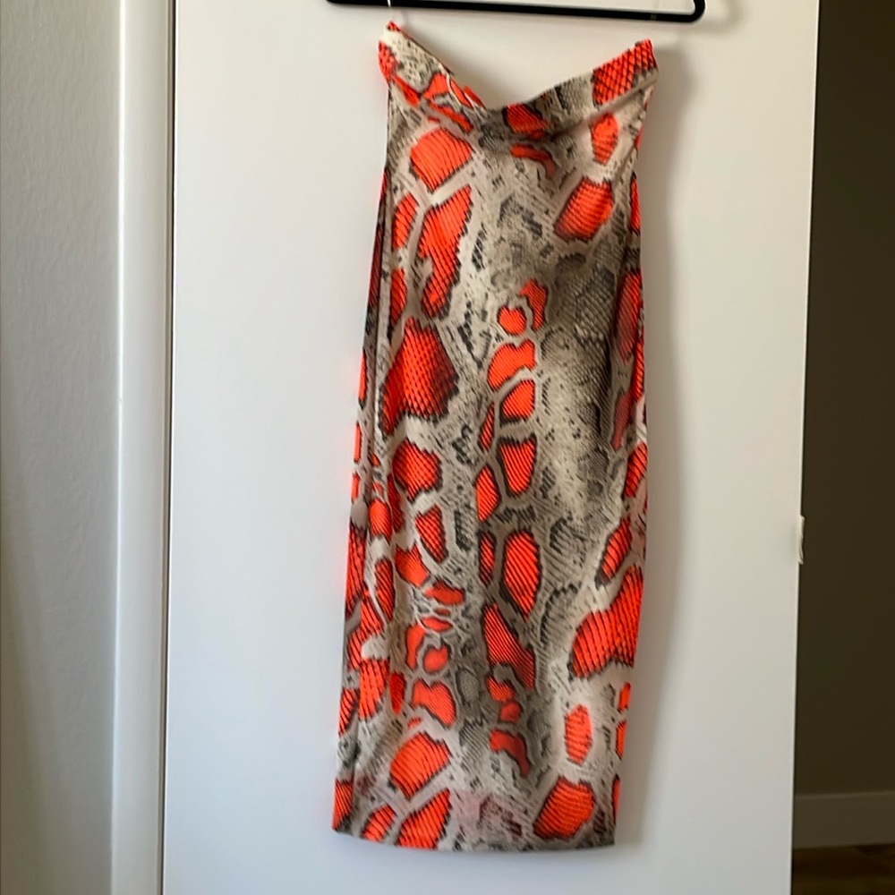 Neutral and orange strapless snakeskin dress